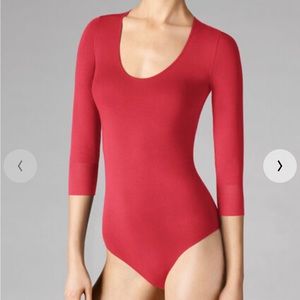Wolford. Red string body suit. 3/4 sleeve. Stretchy.